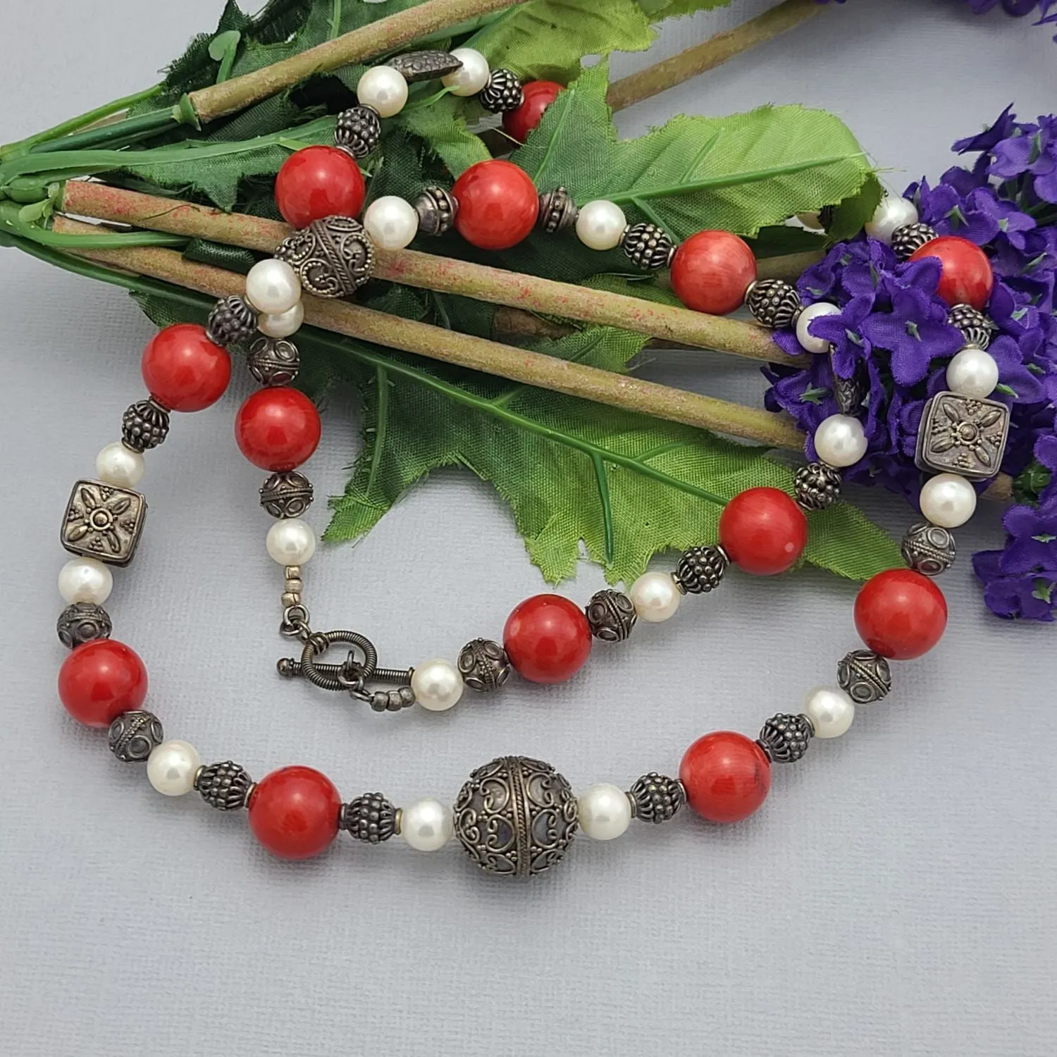 Handmade Red Coral and Pearl Beaded Necklace with Silver Accents.