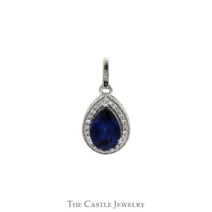 Pear Cut Sapphire Pendant with Diamond Halo in 10k White Gold