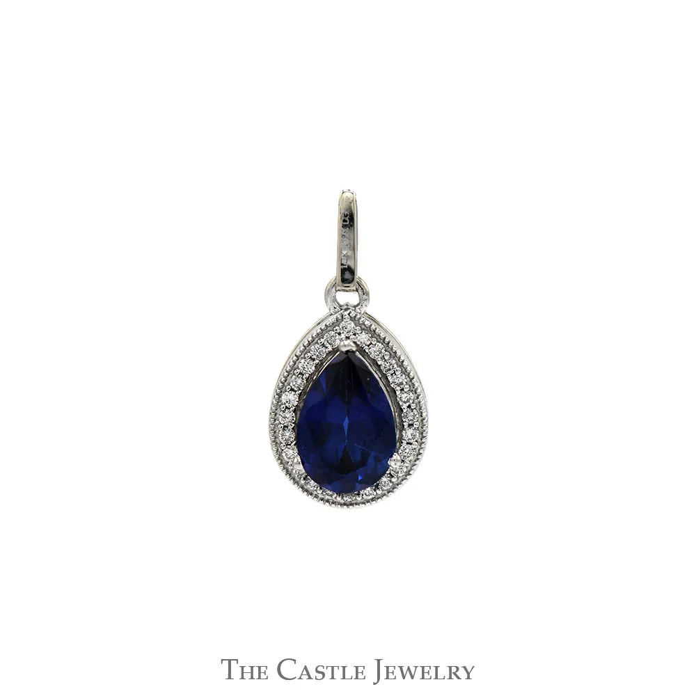 Pear Cut Sapphire Pendant with Diamond Halo in 10k White Gold