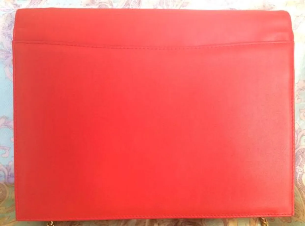 Vintage Valentino Garavani red leather clutch shoulder bag with red flower embroidery deco on the flap and V logo.